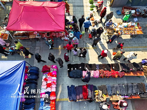 江西贛江新區(qū) 周末集市年味濃，日用百貨聚鄉(xiāng)情